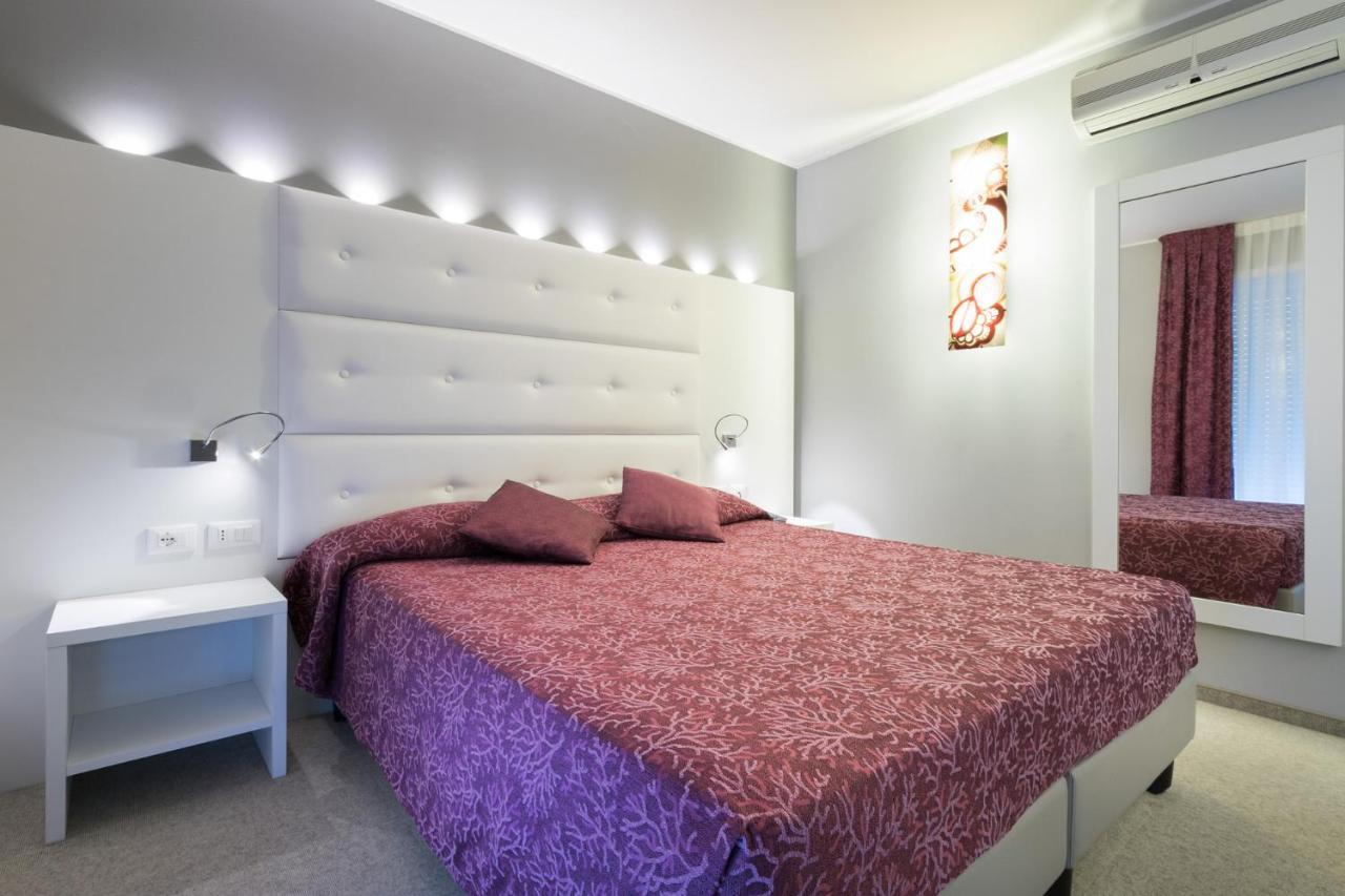 Hotel Al Cigno Lignano Sabbiadoro Bagian luar foto